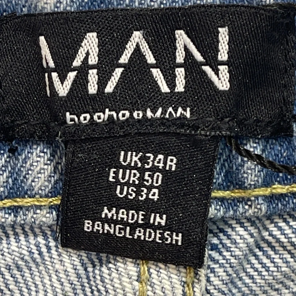 BOOHOO MAN WOMENS Distressed Light Blue Jeans WIDE LEG SIZE.  WAIST 34